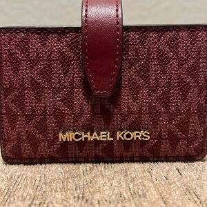 Michael Kors accordian wallet